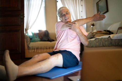 A Veteran stretching at home