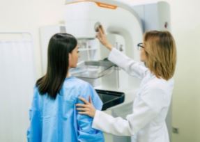 A woman having a mammogram