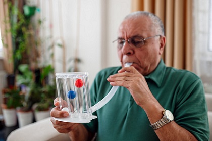 A Veteran measuring his lung capacity 