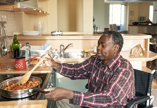 A Veteran preparing a low-carb meal
