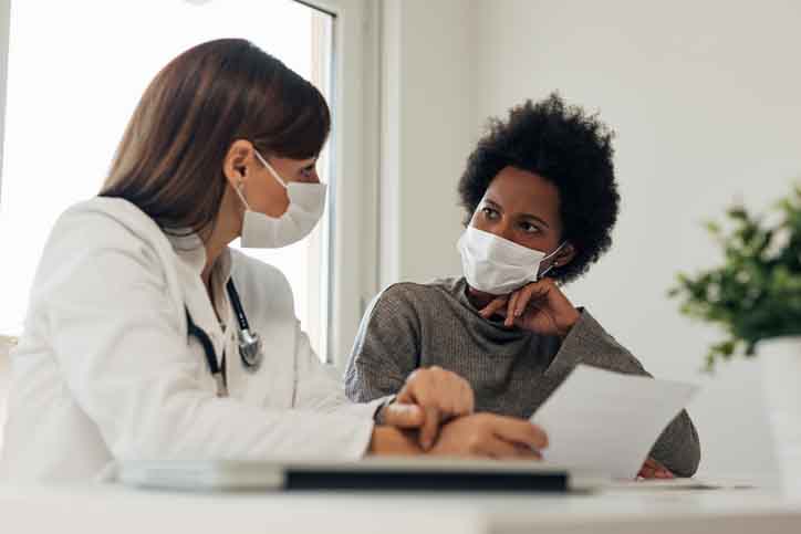 Veteran talking to her doctor