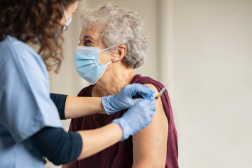 A Veteran receiving a routine vaccination at the VA