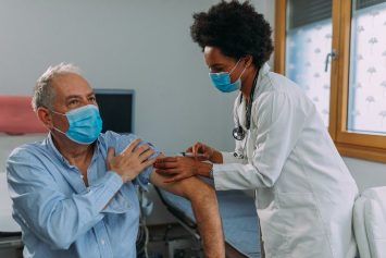 A Veteran receiving his flu shot 