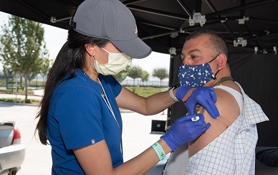 A Veteran receives a flu shot