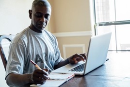 A Veteran using his computer