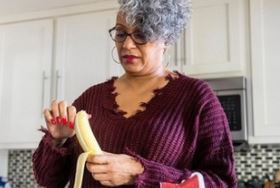 A Veteran eating a bananas