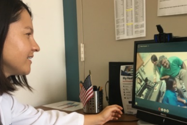 A Veteran and VA health care provider are talking via VA Video Connect