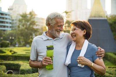 Couple exercising together outside