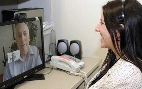 A Veteran using VA Video Connect to talk to their doctor