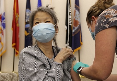 A Veteran receiving a COVID-19 vaccine 