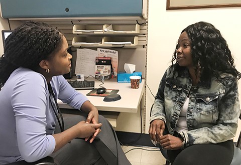 Veteran talking to her doctor about possible health risks