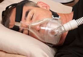 A Veteran using a CPAP machine