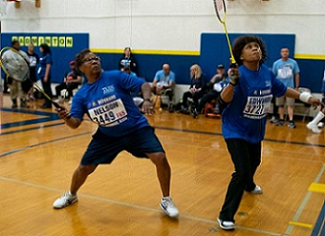 Two Veterans playing badminton