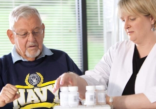 Veteran talks to doctor about medication