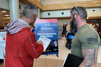 A Veteran being introduced to additional benefits at his local VA