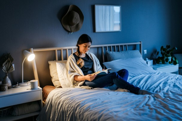 A Veteran reading to relax before going to sleep