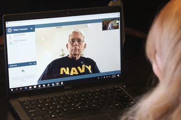 A Veteran using VA Video Connect to talk with his provider