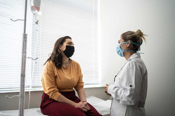 A Veteran talking to her doctor about cancer screenings